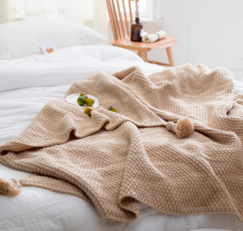 Tasselled knit throw, second view
