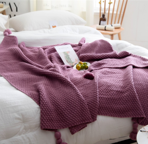 Knit throw blanket folded