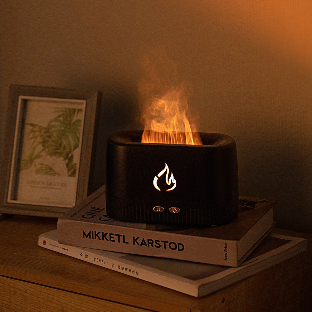 Flame diffuser glowing in a dark room
