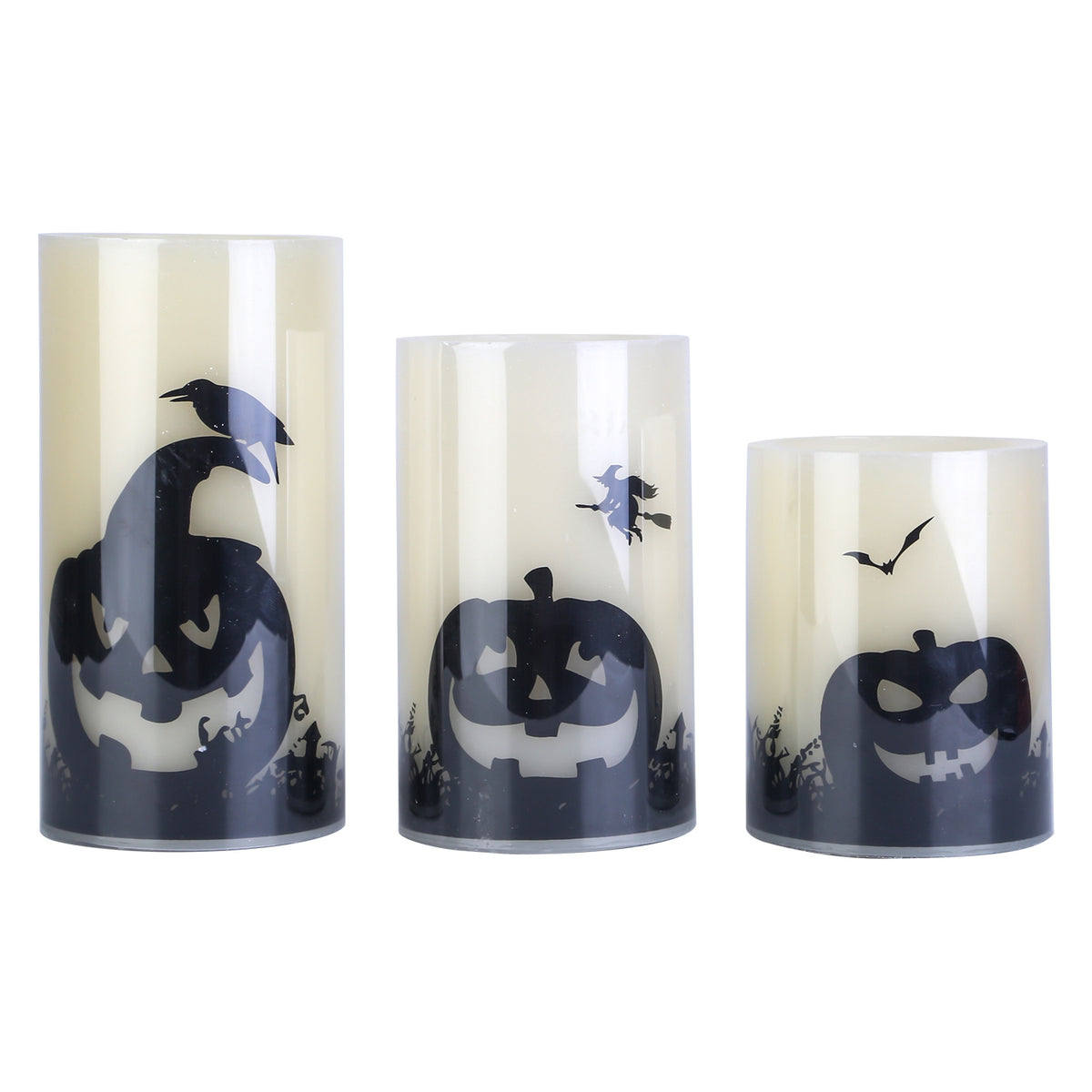Three flameless pumpkin candles, cream wax, on a plain background