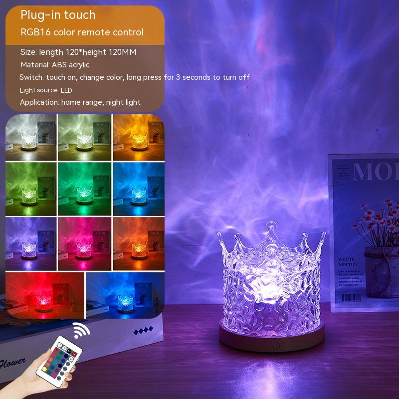 Water ripple crystal lamp casting moving light on a dark wall