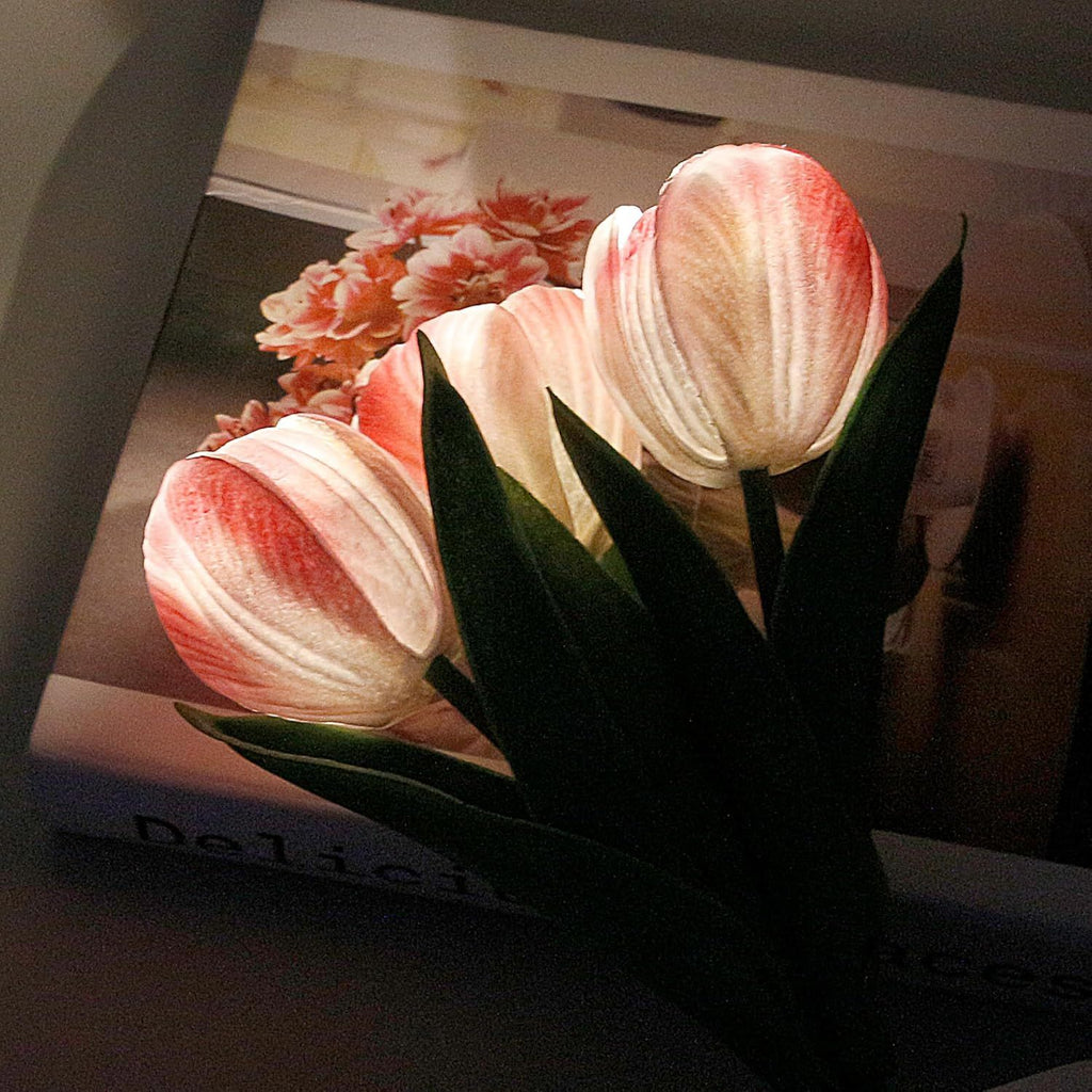 Close view of the pink tulip lamp, lit