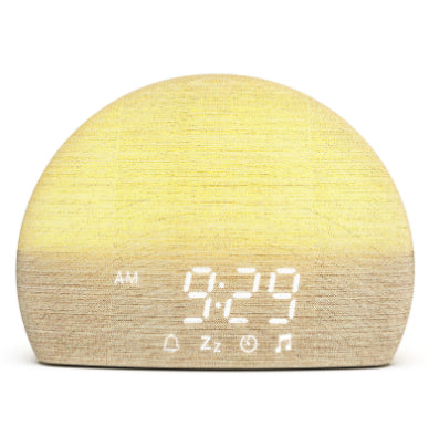 Sunrise alarm clock with a fabric-wrapped dome and white display