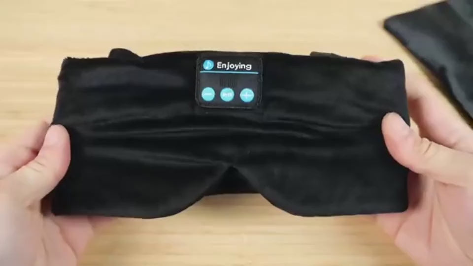 Bluetooth sleep mask: the side controls being pressed, and the mask laid flat