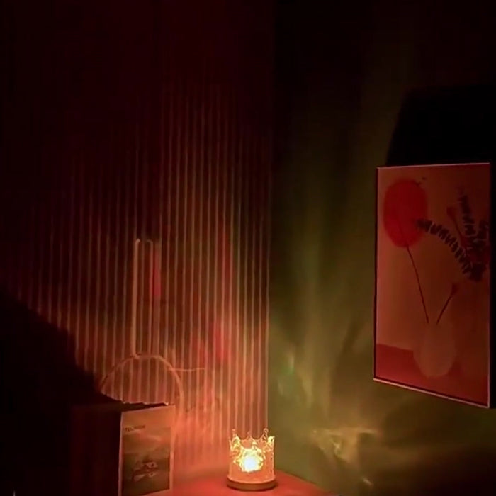 Water Ripple Lamp Crown on a shelf, casting warm amber water light on the wall